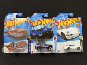 Hot Wheels Carded Vehicles Lot – X-34 Landspeeder, Nissan Patrol Custom, Porsche 911 Carrera RS 2.7
