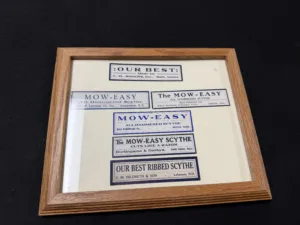 Framed Mow-Easy Scythe Advertising Labels Display